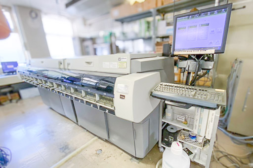 写真：生化学免疫自動分析装置（比色法・CLIA法）
TBAc16000 キャノン・メディカルシステムズ、アボット　ジャパン